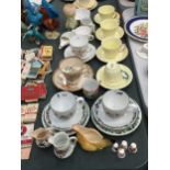 A QUANTITY OF ITEMS TO INCLUDE CROWN STAFFORDSHIRE CUPS AND SAUCERS, WORCESTER 'HERBS' TRIOS, A