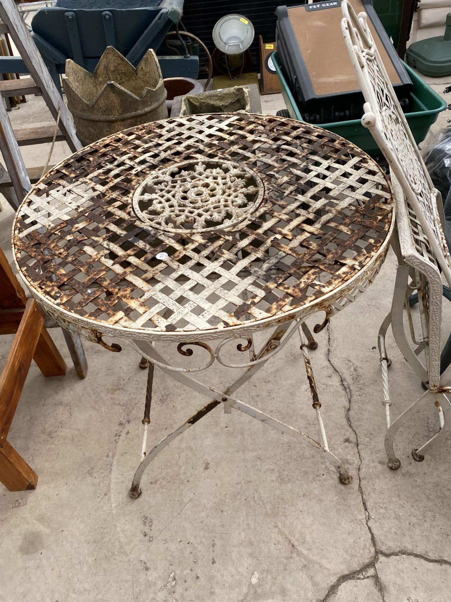 A METAL FOLDING BISTRO TABLE AND CHAIR AND A FURTHER TWO PLASTIC GARDEN CHAIRS - Image 2 of 3