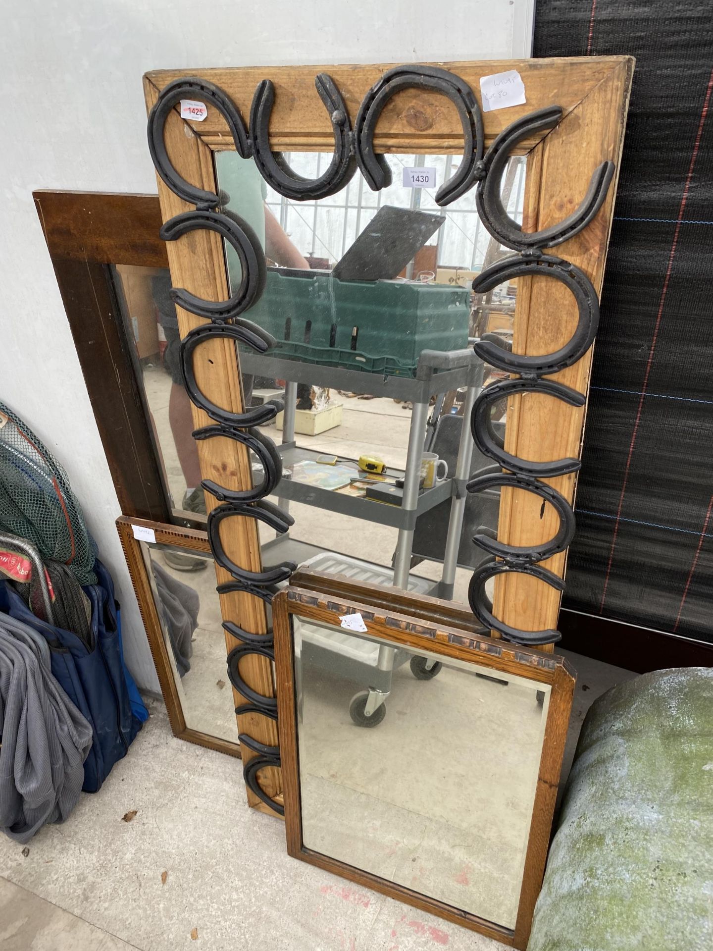 AN ASSORTMENT OF FRAMED MIRRORS