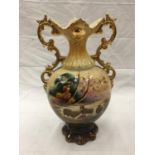 A VINTAGE HAND PAINTED URN WITH GILT DETAILING AND INDISTINCT SIGNATURE TO ART ON FRONT AND RAISED