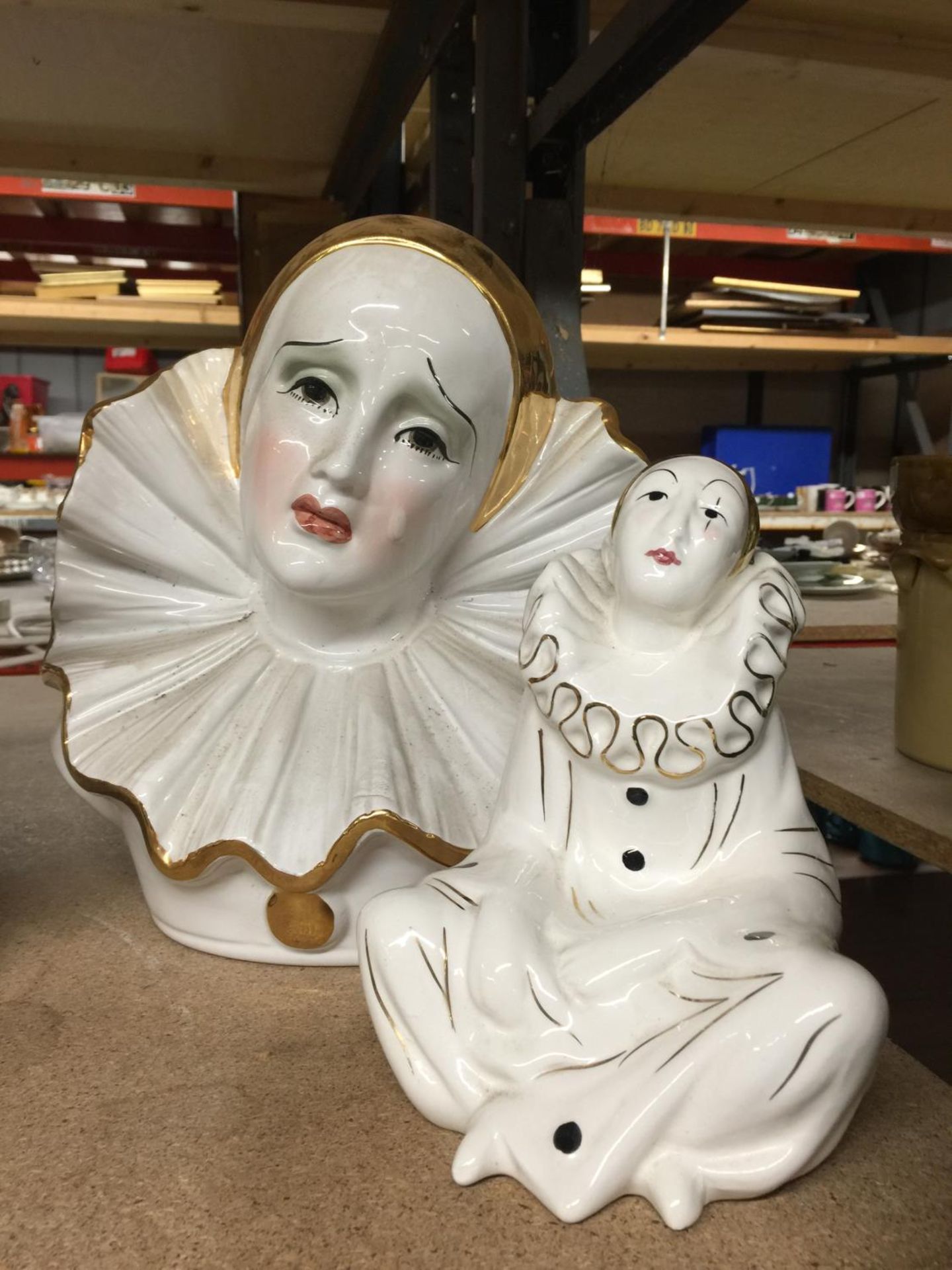 TWO CERAMIC PIERROT FIGURES TO INCLUDE A BUST AND ONE SEATED