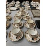 A PART TEASET WITH FLORAL AND GILT DECORATION TO INCLUDE CAKE PLATE, CREAM JUG, CUPS AND SAUCERS
