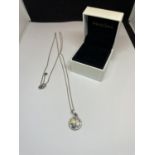 A MARKED SILVER NECKLACE WITH HEART CHARM