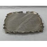 A HEAVY WALKER AND HALL OF SHEFFIELD HALLMARKED SILVER TRAY ON FEET. 36CM X 36CM. WEIGHT 1505 GRAMS