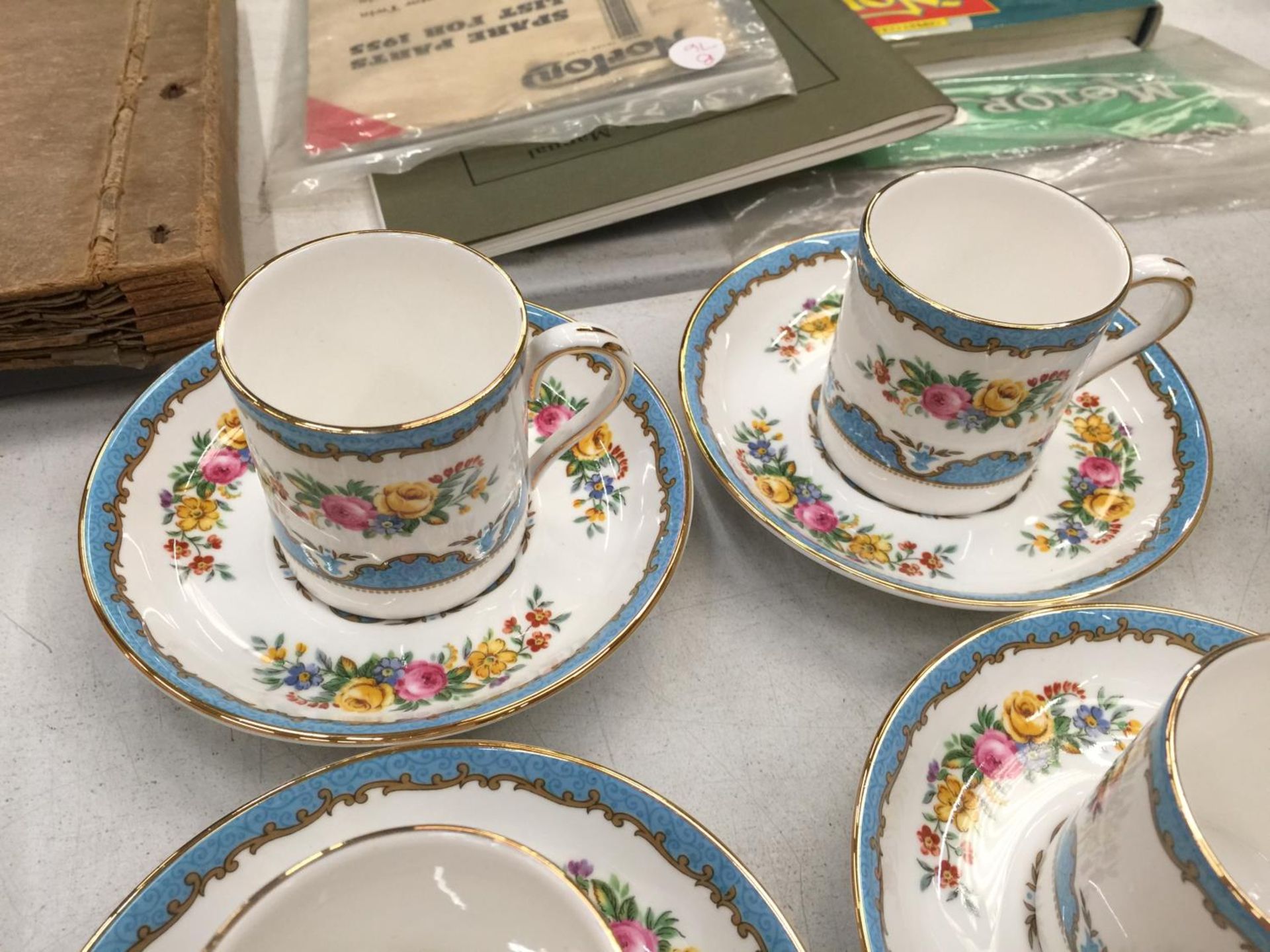 A SET OF SIX CROWN STAFFORDSHIRE CHINA DEMI-TASSE COFFEE CANS AND SAUCERS WITH A FLORAL PATTERN - Image 3 of 3