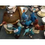A COLLECTION OF COLOURFUL CERAMIC CHICKENS AND DUCKS