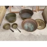 AN ASSORTMENT OF BRASS AND COPPER WARE TO INCLUDE BRASS JAM PANS, A COPPER WASH BOWL AND A BRASS