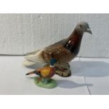 A LARGE BESWICK PIGEON AND A MINIATURE PHEASANT