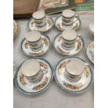 A SET OF SIX CROWN STAFFORDSHIRE CHINA DEMI-TASSE COFFEE CANS AND SAUCERS WITH A FLORAL PATTERN