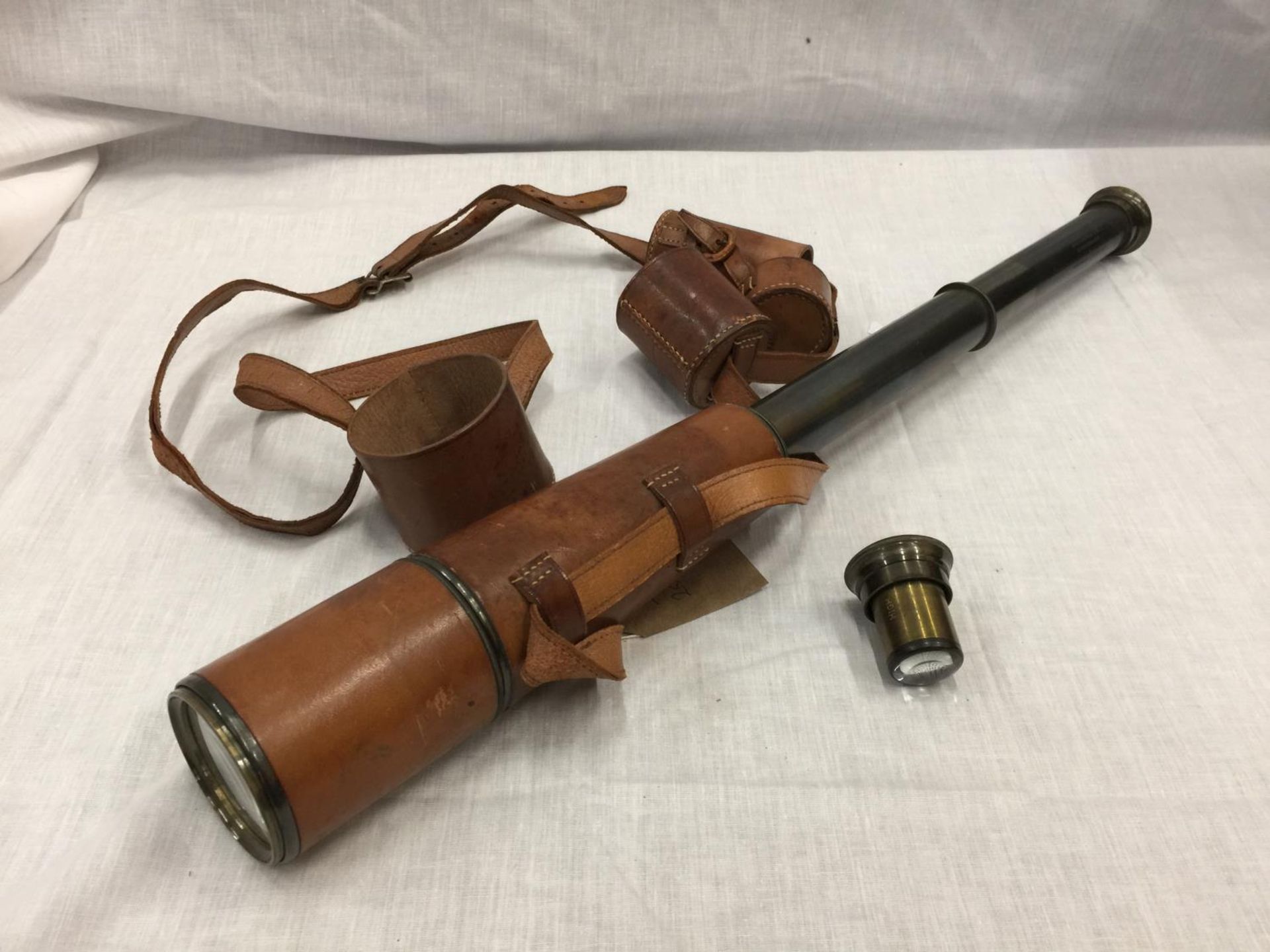 A VINTAGE BRASS AND LEATHER TELESCOPE RECONDITIONED FOR JOHN BARKER & CO LTD KENSINGTON W.8. BY - Image 2 of 16