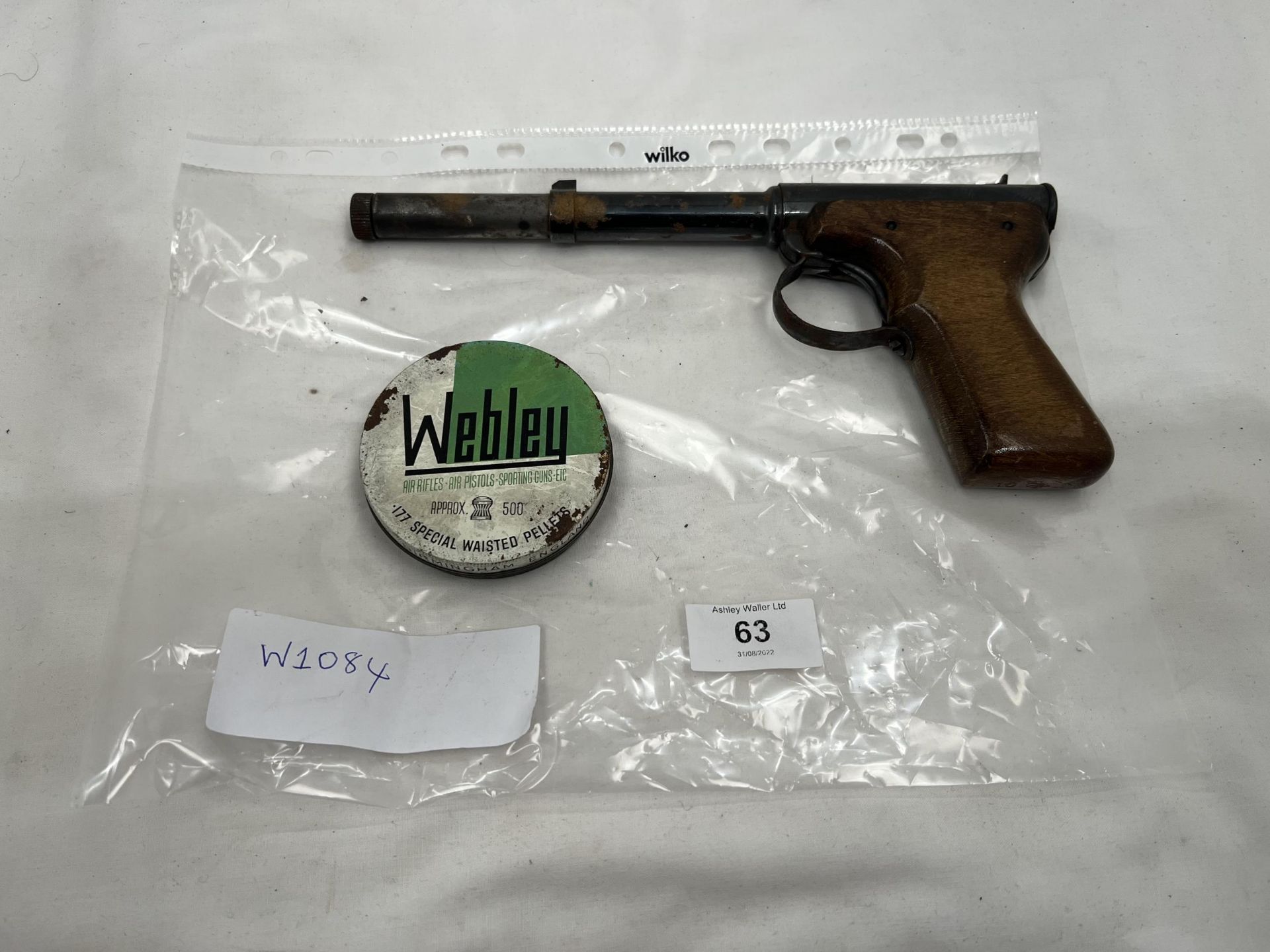 A 'DIANA' AIR PISTOL AND A TIN OF PELLETS