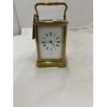 A BRASS JOSEPH PENLINGTON, PARIS, CARRIAGE CLOCK WITH GLASS TO THREE SIDES AND TOP IN WORKING