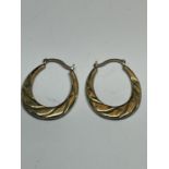 A PAIR OF 9 CARAT GOLD AND SILVER EARRINGS