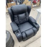 A MODERN BLACK FAUX LEATHER ELECTRIC RECLINING CHAIR BELIEVED IN WORKING ORDER BUT NO WARRANTY