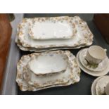 A QUANTITY OF 'HAVILAND & CO' LIMOGES DINNERWARE INCLUDING SERVING PLATES, A SAUCE BOAT, ETC