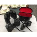 THREE PAIRS OF VINTAGE BINOCULARS TO INCLUDE KALIMAR 12 X 50 FIELD, PRINZ 8 X 30 CASED, ETC