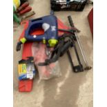 AN ASSORTMENT OF AUTOMOBILE ITEMS TO INCLUDE SAFETY TRIANGLES, A FOOT PUMP AND A WRENCH ETC