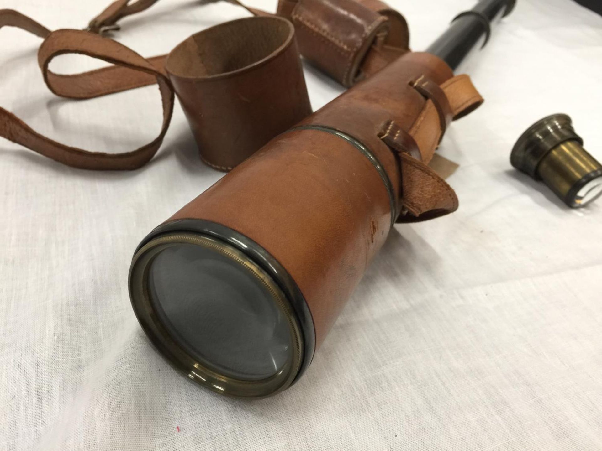 A VINTAGE BRASS AND LEATHER TELESCOPE RECONDITIONED FOR JOHN BARKER & CO LTD KENSINGTON W.8. BY - Image 3 of 16