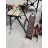 A FOLDING WORK BENCH, A PAIR OF METAL CAR RAMPS AND A TROLLEY JACK