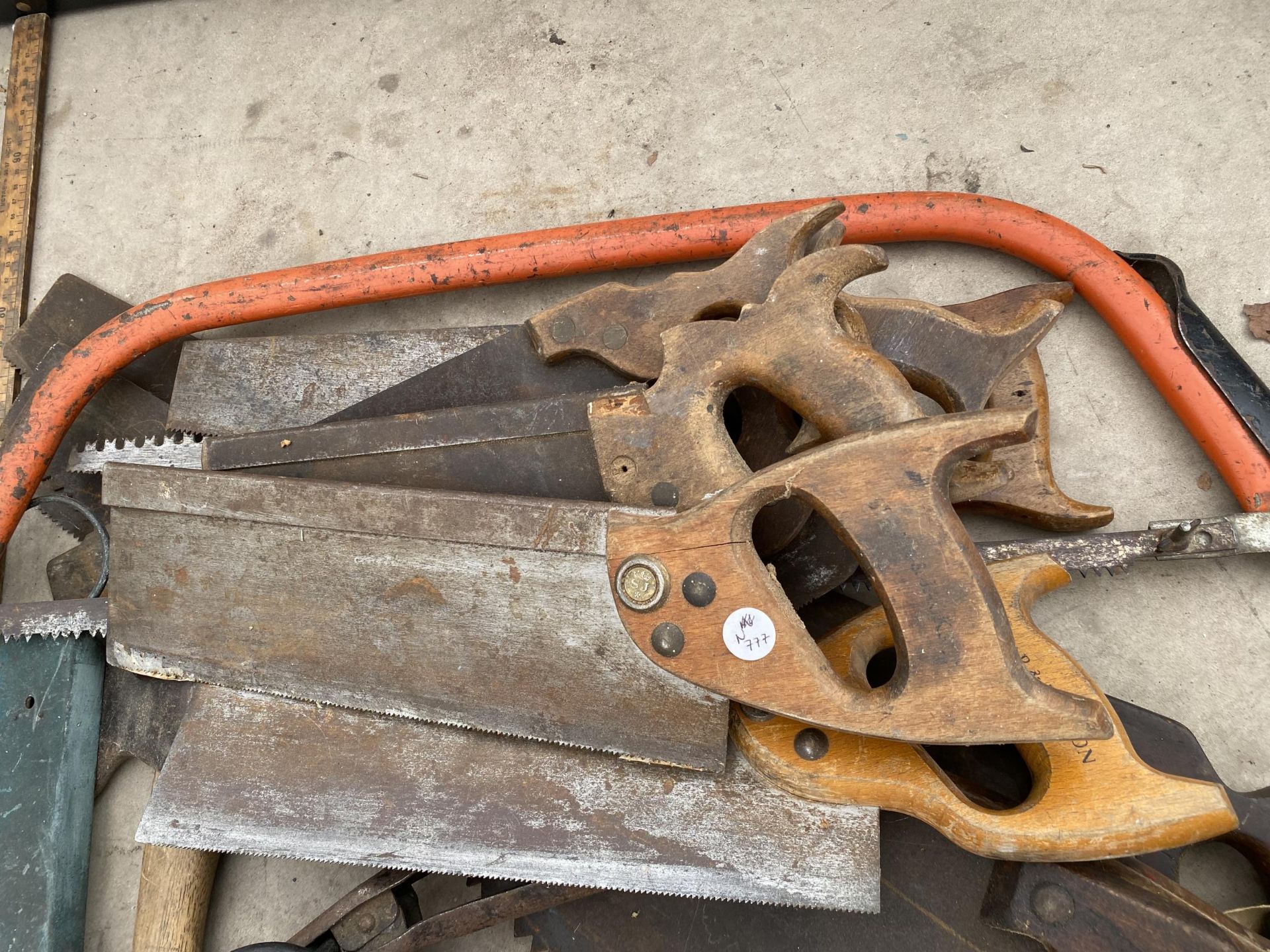 AN ASSORTMENT OF VINTAGE TOOLS TO INCLUDE SAWS, AN AXE AND A 12MM X 1000MM SDS DRILL BIT ETC - Image 2 of 3