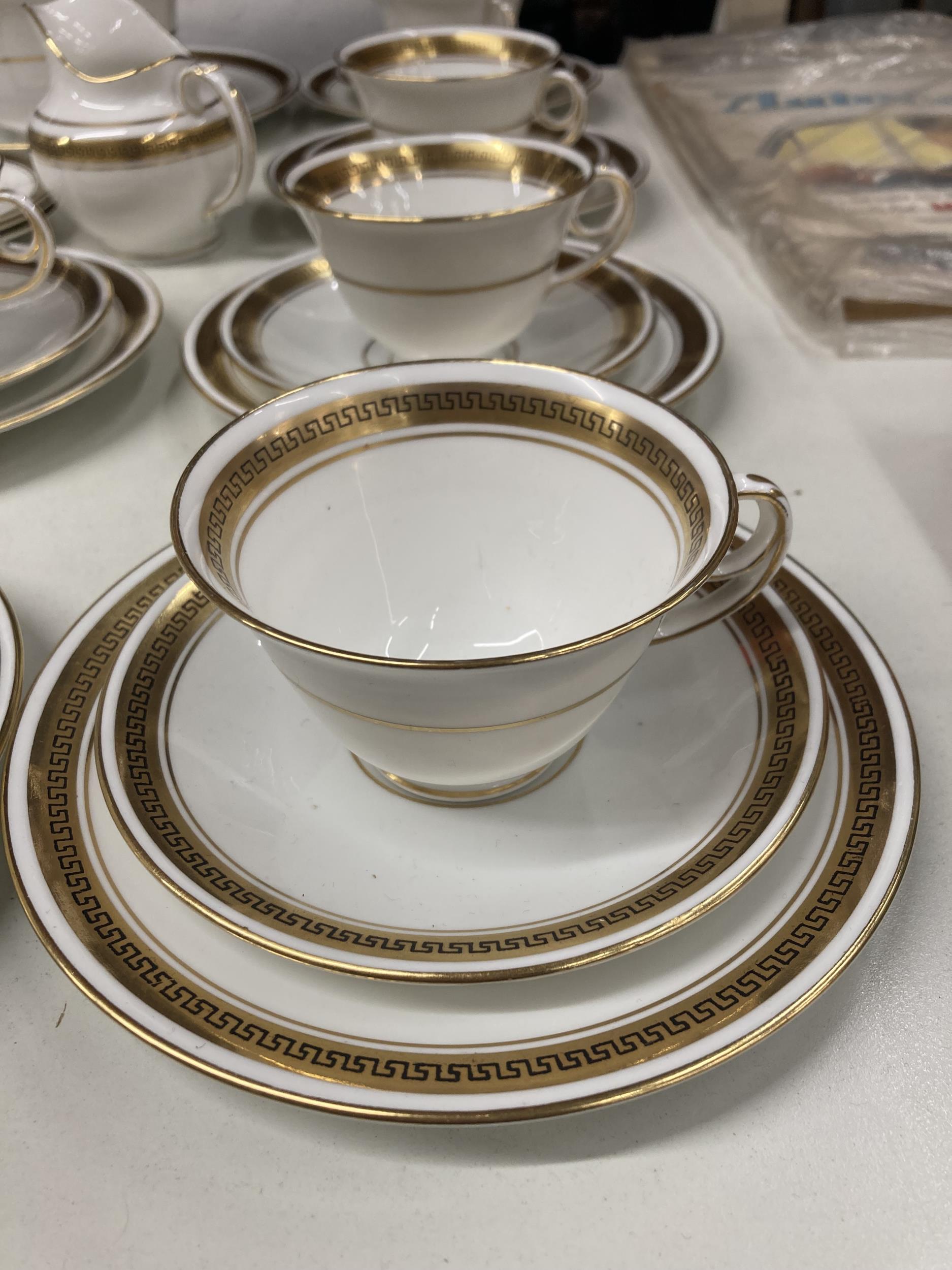 A DIAMOND CHINA WHITE AND GILT PART TEASET TO INCLUDE CUPS, SAUCERS, PLATES, CREAM JUG, BOWL, ETC - Image 2 of 3