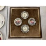 FOUR VINTAGE ROLLS ROYCE BADGES IN LONDON HALLMARKED SILVER FRAMES