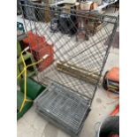 A VINTAGE GALVANISED WINE RACK AND FOUR GALVANISED GRATES