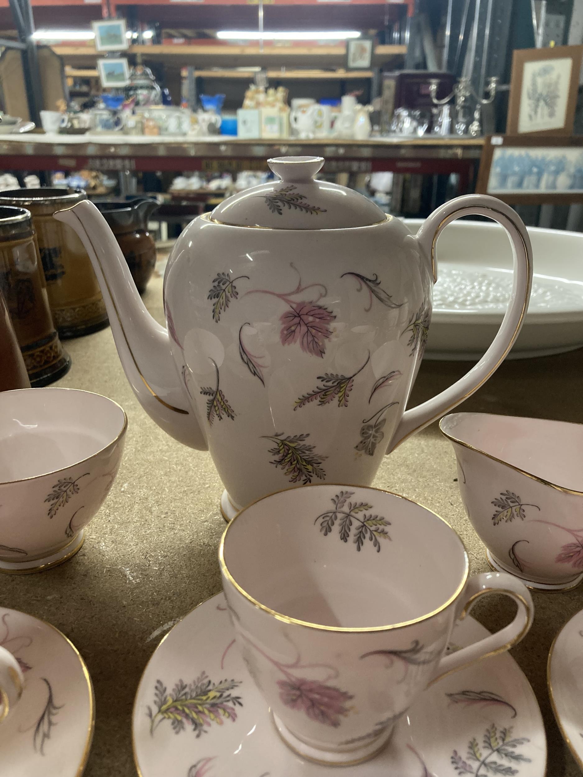 A TUSCAN COFFEE SET IN PALE PINK 'WINDSWEPT' PATTERN TO INCLUDE COFFEE POT, CREAM JUG, SUGAR BOWL, - Image 4 of 4