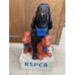 A VINTAGE RSPCA COLLECTION MONEY BOX WITH A DOG AND TWO PUPPIES