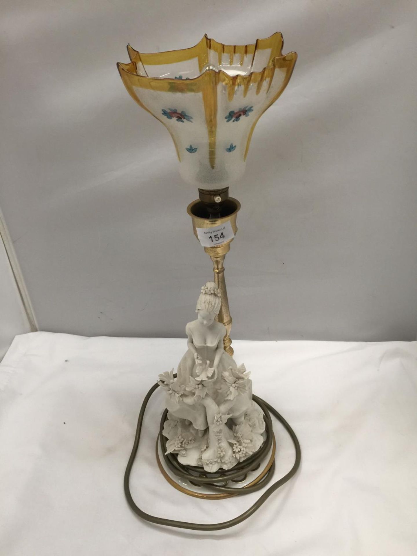 A TABLE LAMP WITH CERAMIC LADY BASE AND GLASS SHADE HEIGHT 44CM