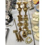 A QUANTITY OF BRASSWARE TO INCLUDE CANDLESTICKS, ETCHED VASES, SHOE HORNS, ETC