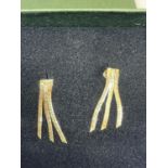 A PAIR OF 9 CARAT TWO COLOUR GOLD THREE STRAND DROP EARRINGS IN A PRESENTATION BOX