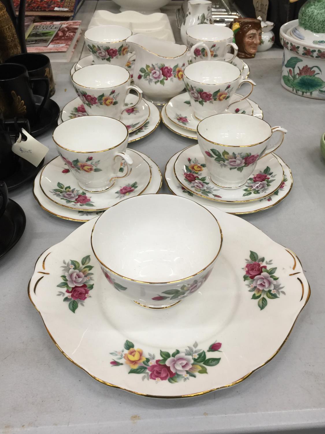 A DUCHESS 'VICTORIA' CHINA TEA SET TO INCLUDE CAKE PLATE, CREAM JUG, SUGAR BOWL, CUPS, SAUCERS AND