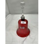 A CRANBERRY COLOURED GLASS BELL HEIGHT 26CM