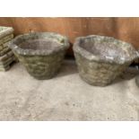 A PAIR OF RECONSTITUTED STONE OCTAGONAL PLANTERS