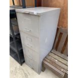 A FOUR DRAWER METAL FILING CABINET