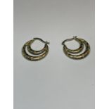A PAIR OF 9 CARAT GOLD BONDED ON SILVER HOOP EARRINGS IN A PRESENTAION BOX