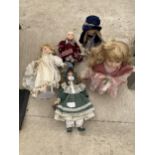 A GROUP OF FIVE PORCELAIN DOLLS