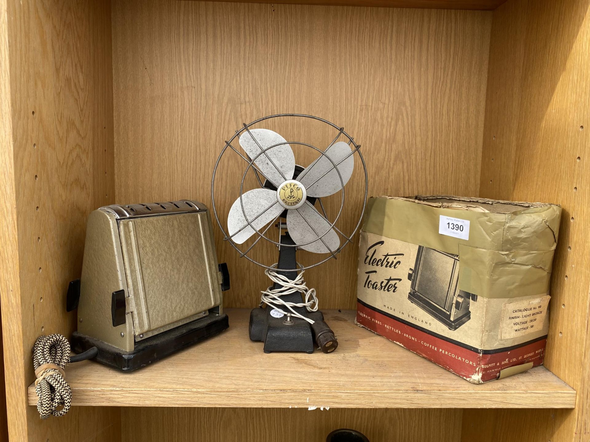 A VINTAGE PIFCO FAN AND A SWAN BRAN TOASTER