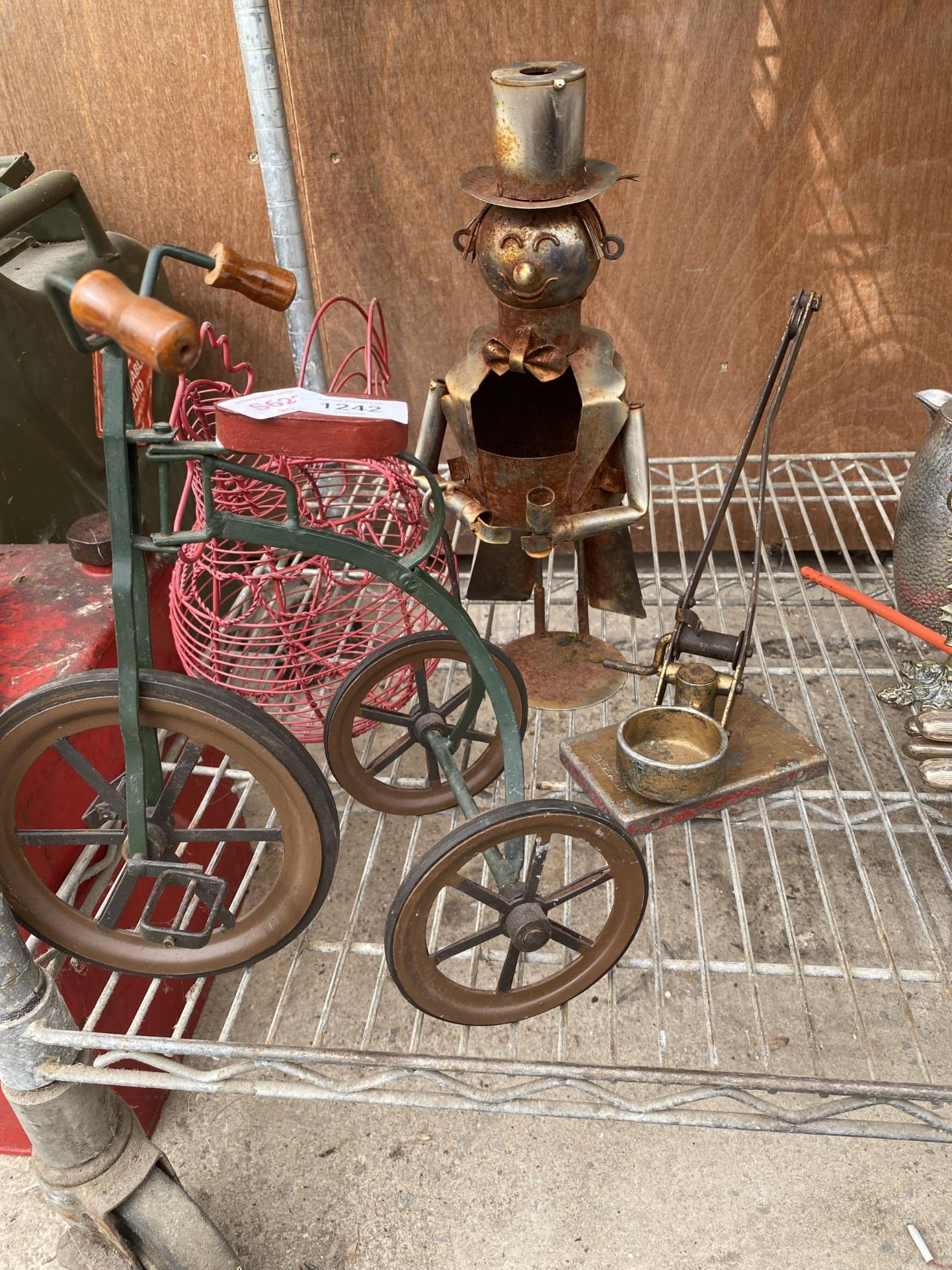 A COLLECTION OF ITEMS TO INCLUDE A WIRE EGG CROCK, A TIN MAN AND A TRICYCLE ETC