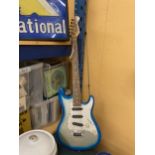 A GROOVE TURQUOISE AND WHITE ELECTRIC GUITAR
