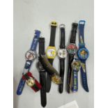 NINE VARIOUS NOVELTY WRISTWATCHES TO INCLUDE MICKEY MOUSE, BART SIMPSON ETC