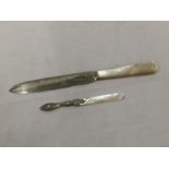 A SHEFFIELD HALLMARKED SILVER KNIFE WITH MOTHER OF PEARL STYLE HANDLE AND FURTHER BIRMINGHAM