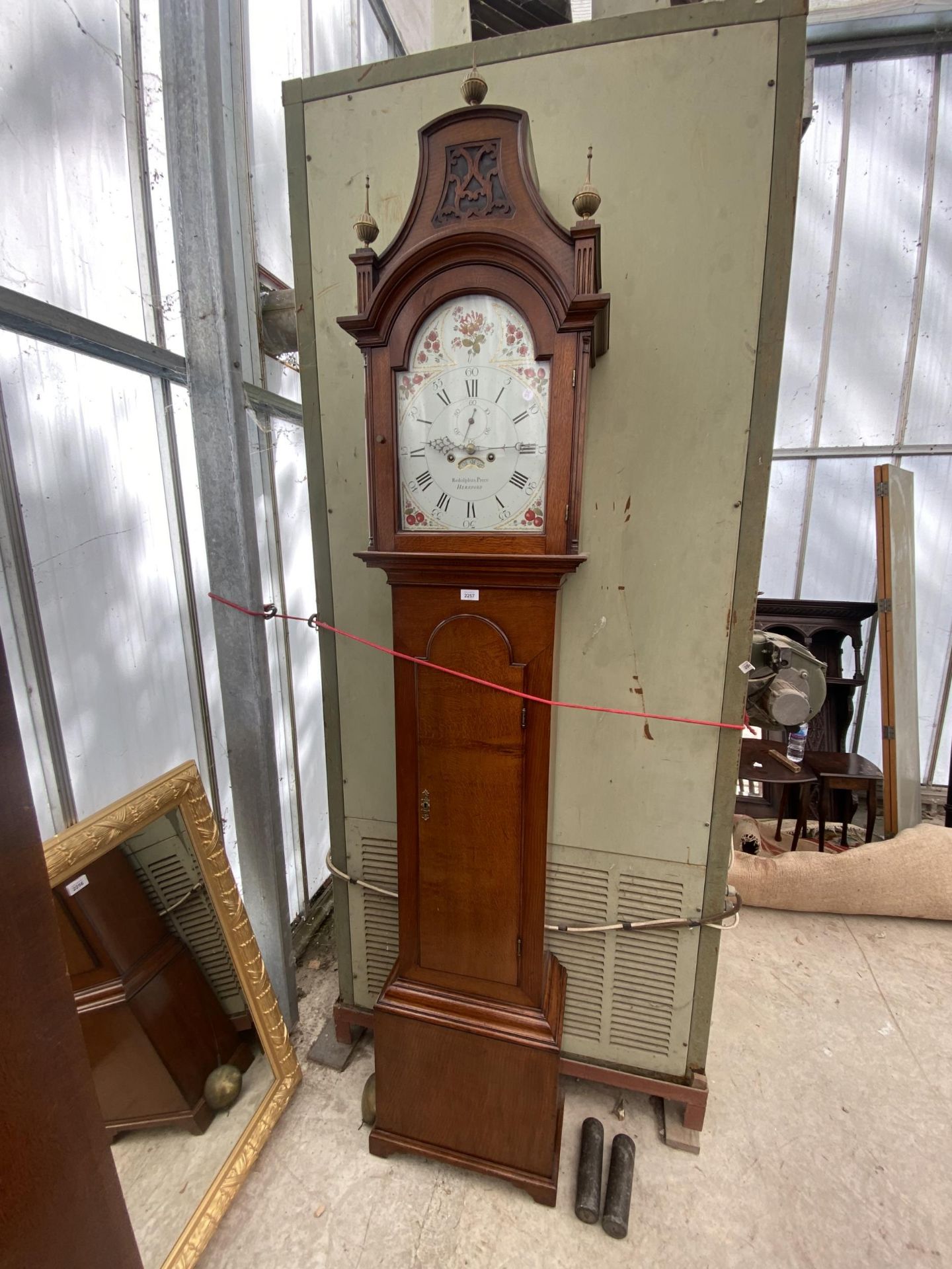 A 19TH CENTURY OAK EIGHT-DAY LONGCASE CLOCK WITH PAINTED ENAMEL FACE BY REDOLPHUS PRECE, HEREFORD