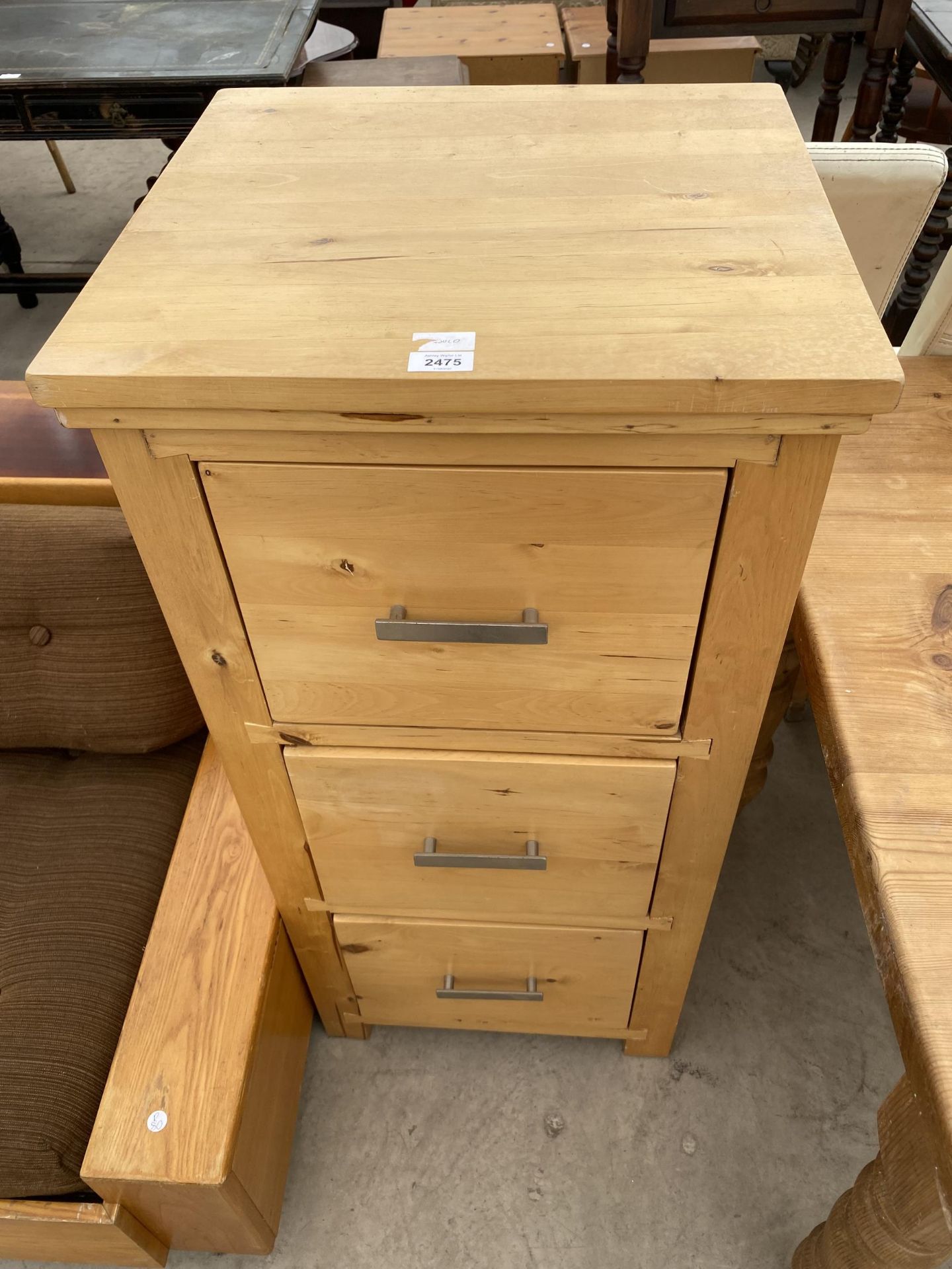 A PINE THREE DRAWER FILING CABINET