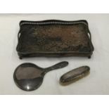 A LARGE SILVER VANITY MIRROR AND BRUSH BOTH CHESTER HALLMARKED AND A SILVER PLATED COPPER TRAY ON