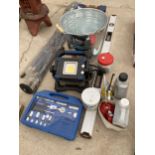 AN ASSORTMENT OF TOOLS TO INCLUDE OIL CANS, A SPIRIT LEVEL AND A SOCKET SET ETC