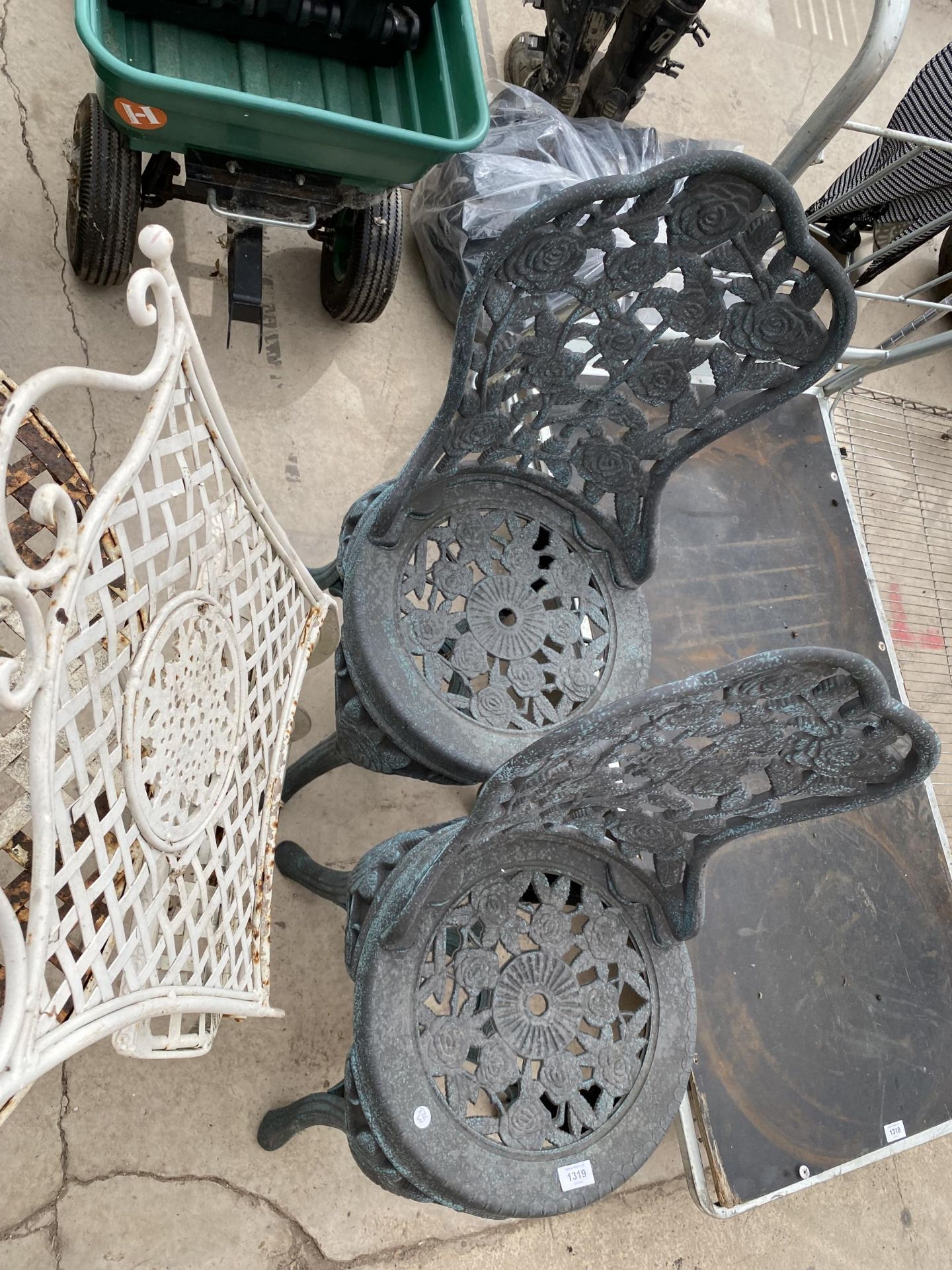 A METAL FOLDING BISTRO TABLE AND CHAIR AND A FURTHER TWO PLASTIC GARDEN CHAIRS - Image 3 of 3