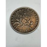 A 1915 TWO FRANCS SILVER COIN