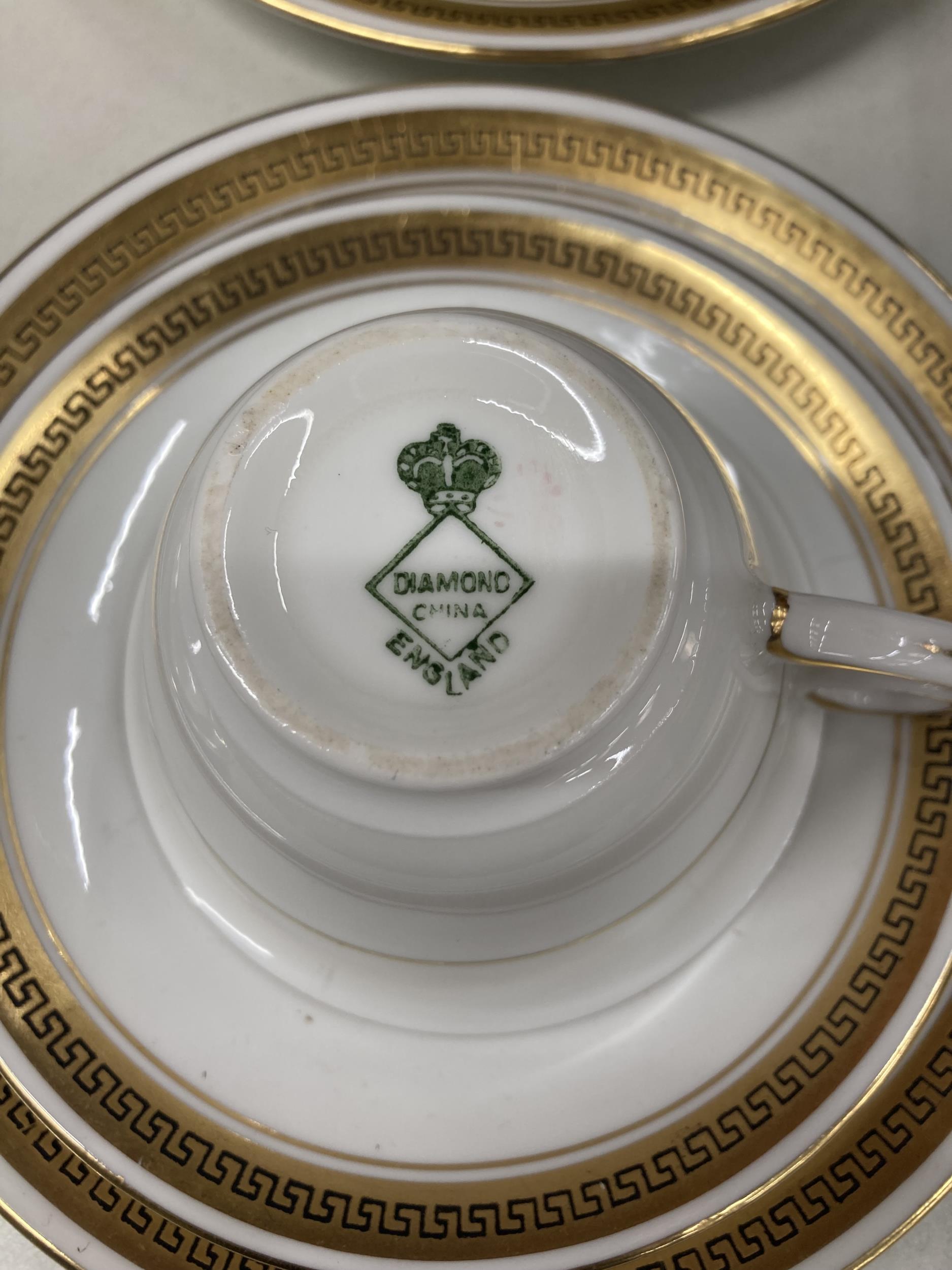 A DIAMOND CHINA WHITE AND GILT PART TEASET TO INCLUDE CUPS, SAUCERS, PLATES, CREAM JUG, BOWL, ETC - Image 3 of 3